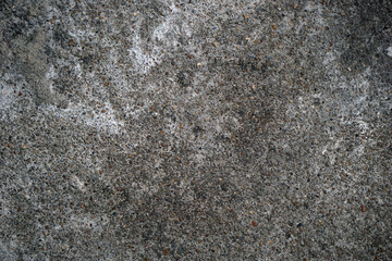 The shadow of the old gray cement wall surface