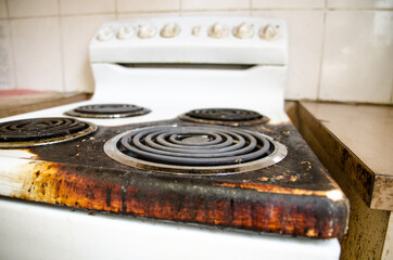 Heating element burned out on the stove in the old kitchen.
