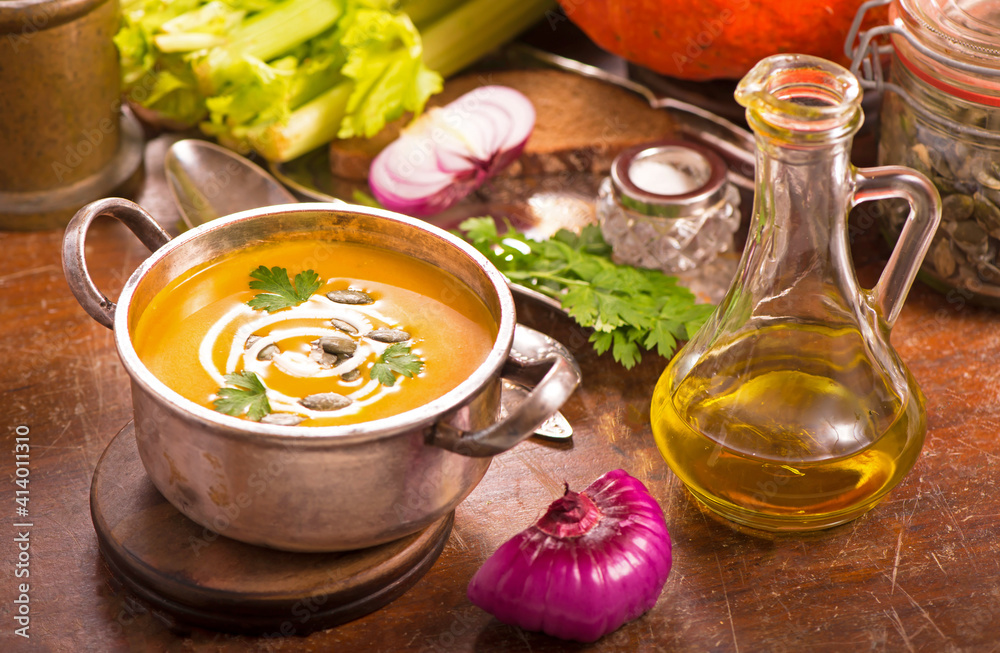 Canvas Prints winter cooking, healthy food. pumpkin soup on rustic wooden background