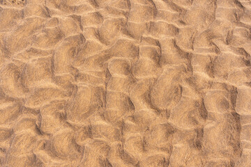 Sand formed by the waves