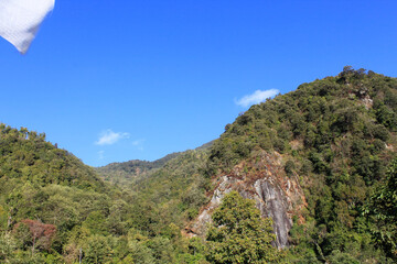 Beautiful hill with blue sky and few clouds in local village of Nepal