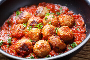 pan of meatballs with tomato sauce