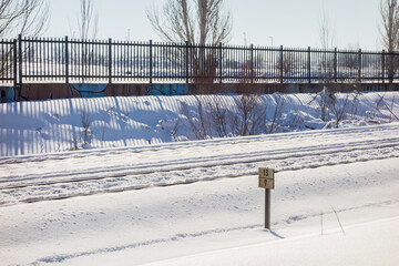 Snowy train tracks in Coslada on a cold winter's day.
