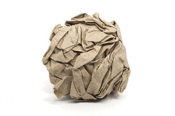 Crumpled piece of recycled paper on white background. Green waste