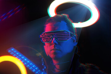 Cyberpunk style portrait of man in futuristic costume. Image with glitch effect.