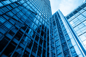 Fototapeta na wymiar Looking Up Blue Modern Office Building