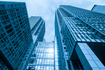 Looking Up Blue Modern Office Building