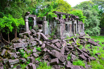 The view of Beng Mealea temple and moss covered stones in Cambodia