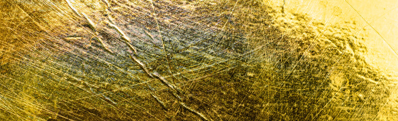 a sheet of paper painted with gold paint. background or texture