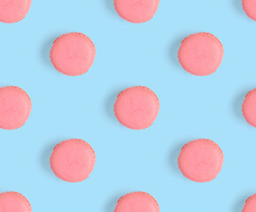macarons seamless pattern. macarons isolated on blue background.