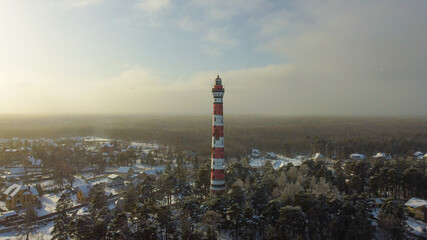 Lighthouse on the shore of the Gulf of Finland, in winter.