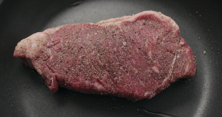 new york steak on nonstick pan