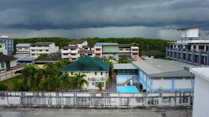 the view out of a hotel window on a rainy day in Krabi, Southern Thailand, March