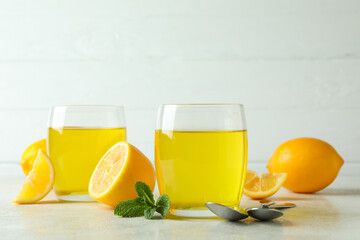 Concept of dessert with lemon jelly on white textured table