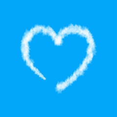 Fototapeta premium Plane track or white cloud heart isolated on blue background.