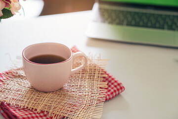 Coffee Time, Cup of coffee and laptop place on white home office.