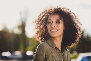 Profile photo of wavy hairdo attractive cheerful dark skin person look far away enjoy sightseeing...