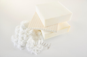 Bed sponge and spring with cotton on the white table style.