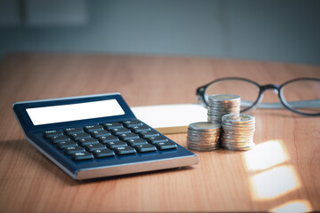 A calculator with white fields to put text on the table. Business concept for taxes, finance, loan calculate