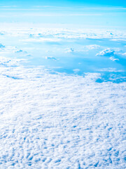 Above the cloud, sky view from airplane window.