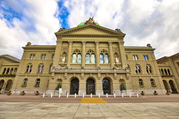 Fototapeta na wymiar Federal Palace facade in Bern, Switzerland. Swiss Parliament building in Bundesplatzn square. Landmark of historical town Bern, Capital of Switzerland. Canton Bern.