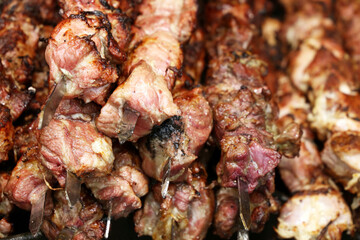 Kebab on the grill, meat cooking on charcoal
