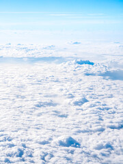 Fototapeta na wymiar Above the cloud, sky view from airplane window.