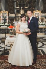 Wedding couple bide and groom get married in a church