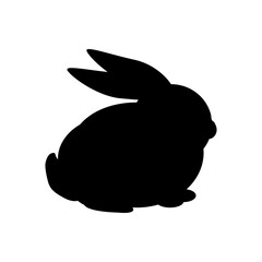 Conejo de pascua. Logotipo con silueta de conejito sentado en color negro