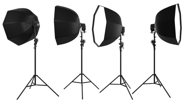 Photo studio lighting stands with flash and octobox isolated on the white.