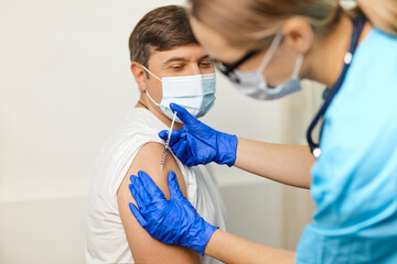 Close up of man vaccinated in a doctor's office