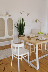 white furniture in the living room in the apartment