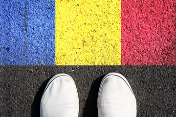 Sneakers and the Romania flag. View from above.