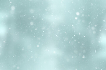 blurred snow / winter abstract background, snowflakes on abstract blurred glowing leaf background