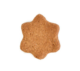 Star shaped baked chocolate gingerbread cookie isolated on white background