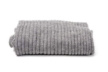folded gray knitted scarf isolated on white background