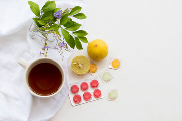 herbal health care mix honey lemon with cough sore throat pastille pills arrangement flat lay style on background white