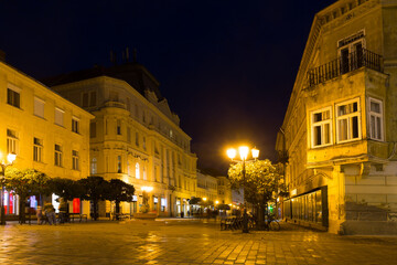 Fototapeta na wymiar View on night streets of Gyor is colorful landmark of Hungary outdoors.