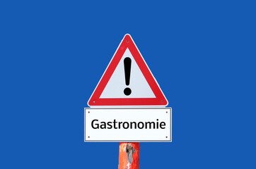 Warnschild Gastronomie auf blauen Hintergrund