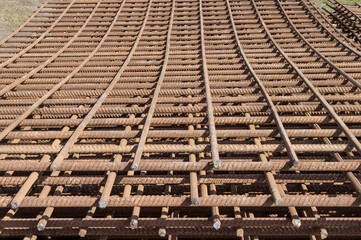 Lattices of reinforcing steel for the manufacture of concrete construction