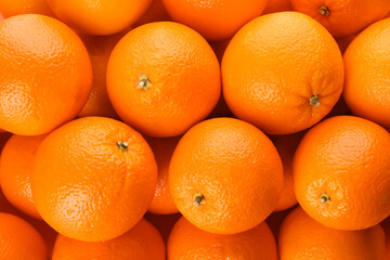 Fresh ripe oranges as background, top view