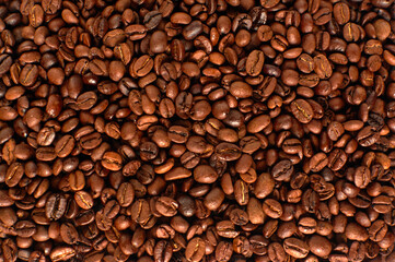 Background of roasted fresh brown coffee beans - perfect for a cool wallpaper
