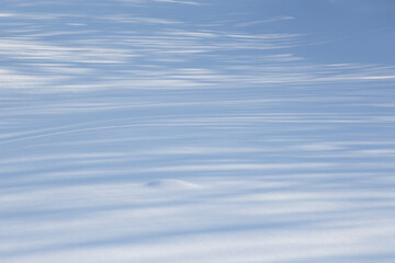 Blue snow with shadows