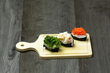 fresh raw pork, meat ,beef, belly, sliced on square plate  on wood, wooden background,set shabu, hot pot ingredients.