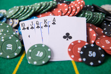 poker chips on cards