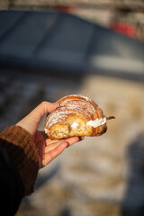 Semla croissant with puff laminated flaky pastry dough and whipped cream and almond paste filling. yummy fastelavnsboller typical carnival scandinavian dessert, danish pastry february