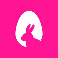 Logotipo con silueta de orejas de conejo en huevo de pascua en afiche de color rosa