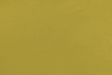 Mustard homogeneous background with a textured surface,