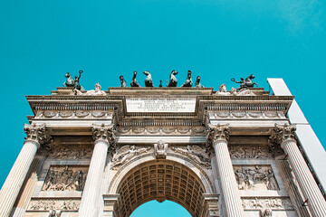 Fototapeta na wymiar Porta Sempione is a city gate of Milan. The gate is marked by a landmark triumphal arch called Arco della Pace , Arch of Peace