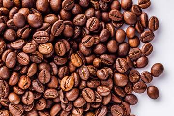 aromatic fresh coffee beans on a white acrylic background